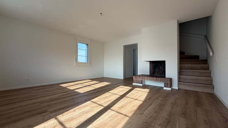Wohnzimmer mit Cheminée