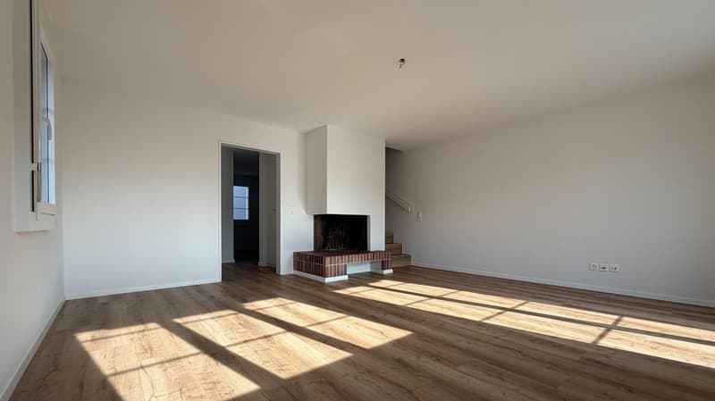 Wohnzimmer mit Cheminée