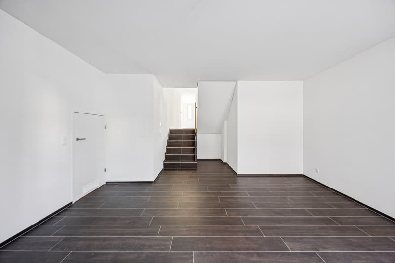 empty hallway with staircase