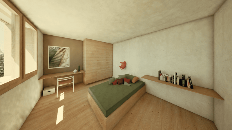 Spacious bedroom with wooden floors, white walls, large windows, a built-in desk, and a green upholstered bed. There is a bookshelf along one wall and a framed artwork on the wall above the desk.