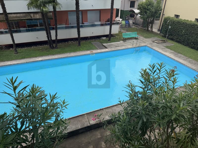 In the central area, large balcony and pool (2)