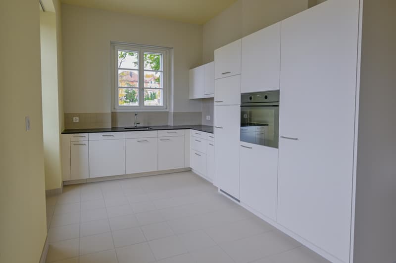 Charmante 5.5-Zimmer-Wohnung mit Kachelofen und Fischgrätparkett (5)