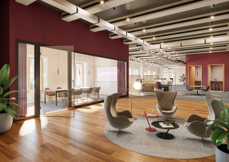 Large open-concept office space with hardwood floors, red accent walls, and modern furniture including chairs, tables, and a projector screen. The space features a fireplace and has a bright, airy feel with ample natural lighting from the windows.