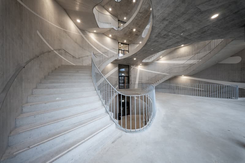 concrete walls, metal handrails, concrete steps, metal railing