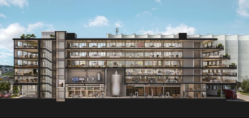 Multi-story office building, glass windows, balconies, interior equipment