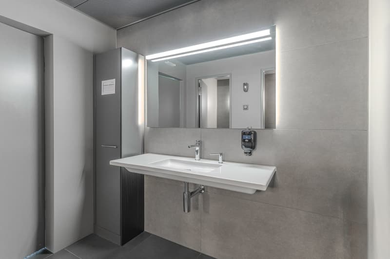 a modern and clean washbasin in a minimalist bathroom