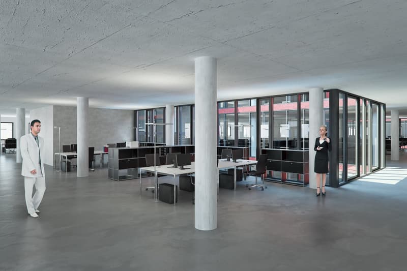 Modern office space, light colored walls, sleek furniture, large windows, bright lighting, well-organized