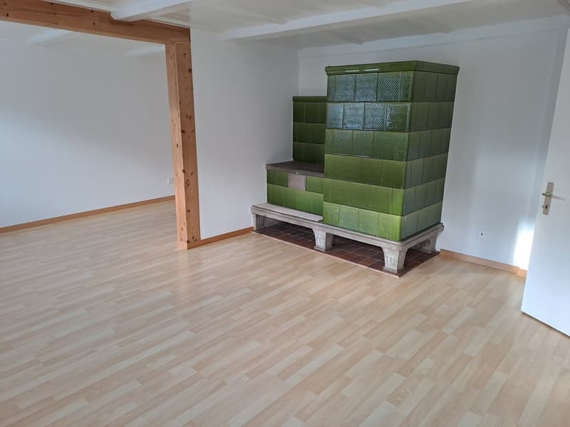 Wohnzimmer mit Kachelofen