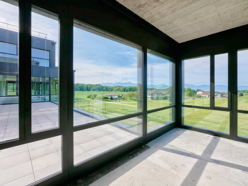 empty room, large windows, tiled floor, open view of outdoor area