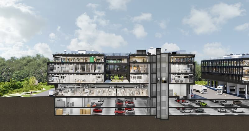 Multi-story office building with underground parking and loading docks