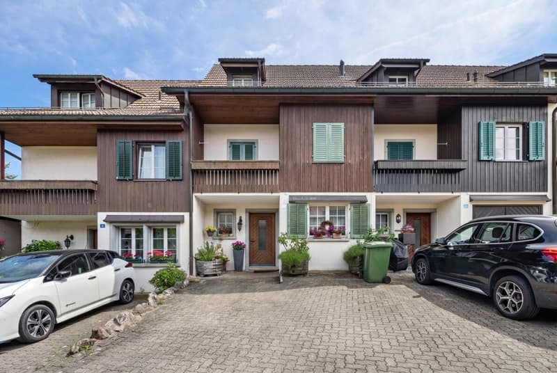 Affascinante casa a schiera di 6,5 locali in una posizione familiare (1)