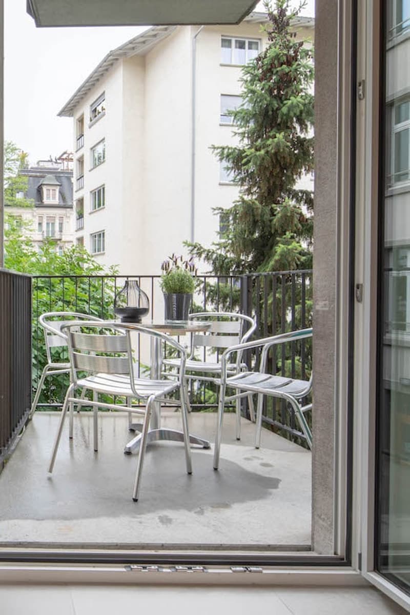 Balcony with table and chairs