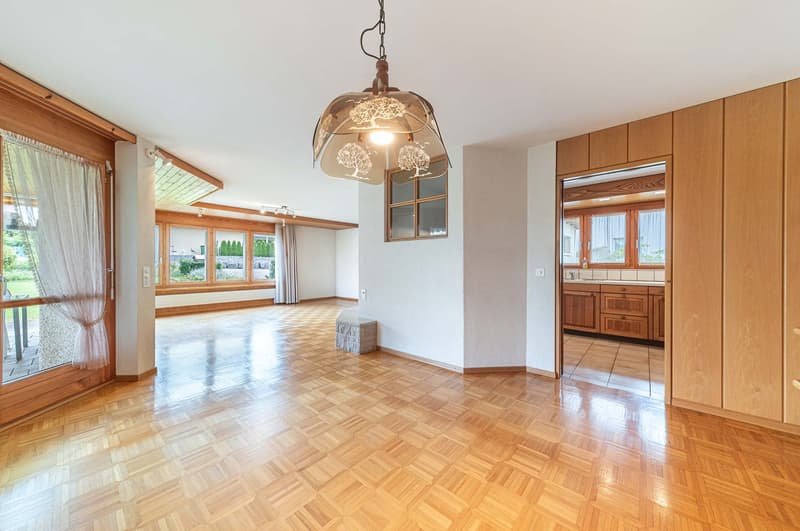 wooden floor, large windows, balcony, large chandelier