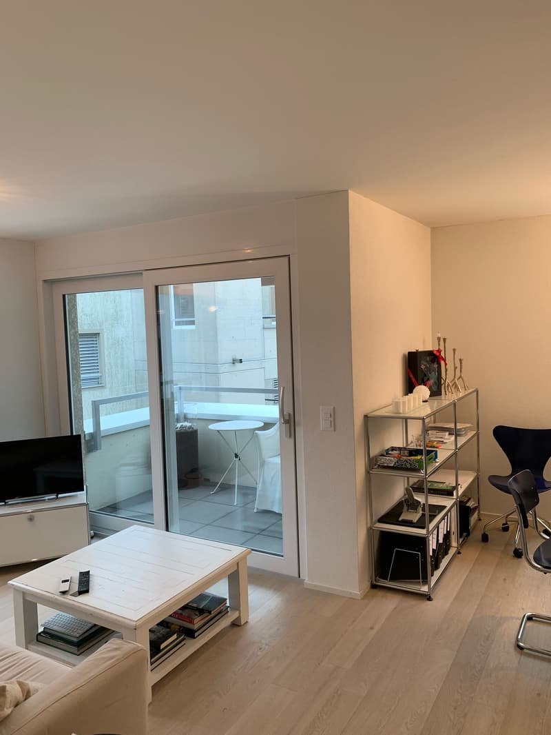 Das Wohnzimmer mit Balkon