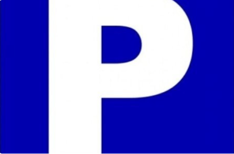 Parking area sign, blue and white color scheme