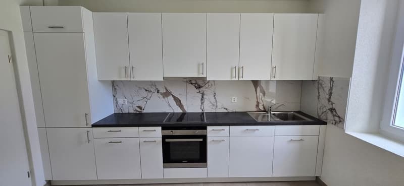 Spacieux appartement de 3.5 pièces au cœur du Locle, rénové (1)