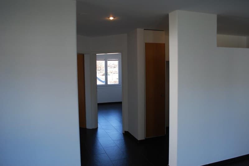 tiled floor, white walls, doors, window