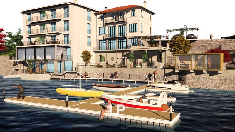 2 story building, large windows, 2 balconies, yacht parking, stone walls, water view