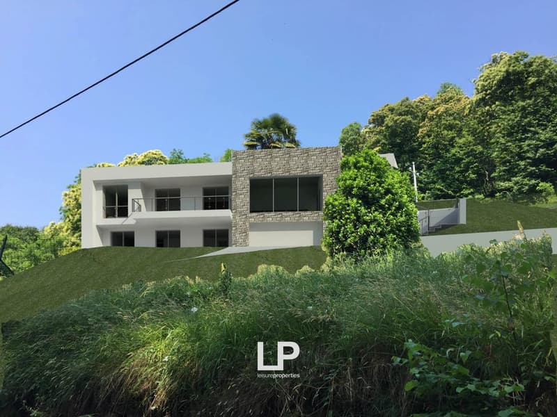 2 story modern house with stone exterior, large windows, balcony, surrounded by lush greenery and trees