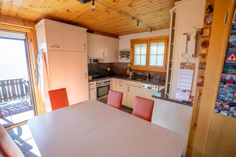 dining table, chairs, kitchen, cabinets, countertop, oven, sink, dishwasher