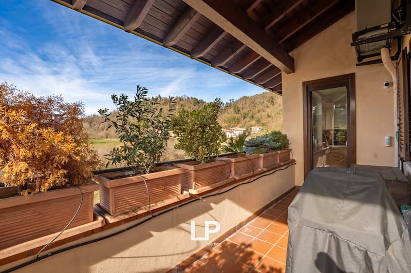 covered terrace, wooden ceiling, terracotta floor, terrace with plants, covered barbecue
