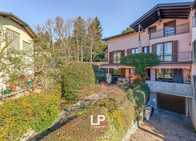 Detached house with balcony, located on the slope of a hill