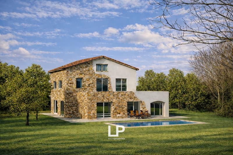 Stone and white walls, red roof, large windows, swimming pool, outdoor dining area