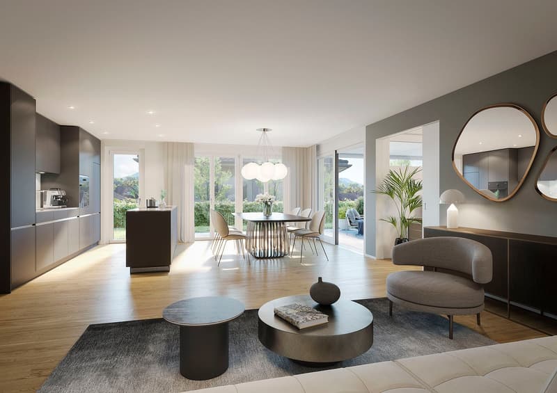 Open plan living room and dining area with wooden flooring, modern round table, elegant chairs, and sliding glass doors leading to a garden