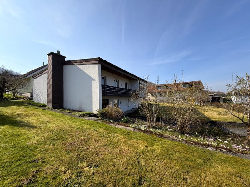 Detached house, white and brown exterior, balcony, chimney, garden, lawn