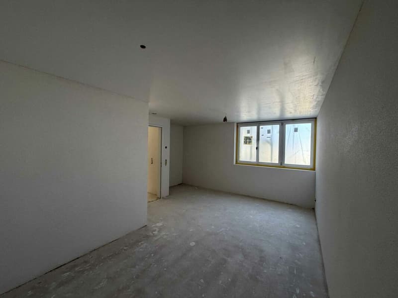 Zimmer im Edelrohbau der Wohnung 1