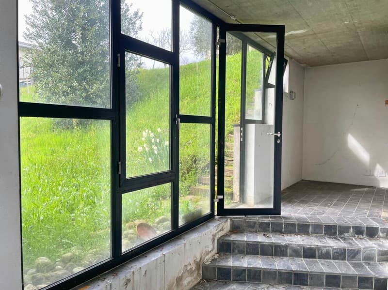 Casa unifamiliare su tre livelli con terrazza panoramica e giardino (15)
