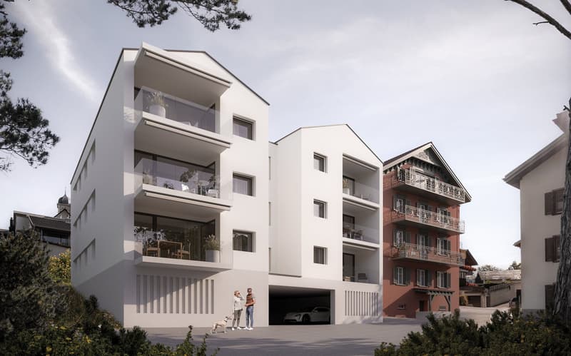 Modern multi-storey building, white facade, large windows, glass balconies, garage at the entrance, car parked in the garage.