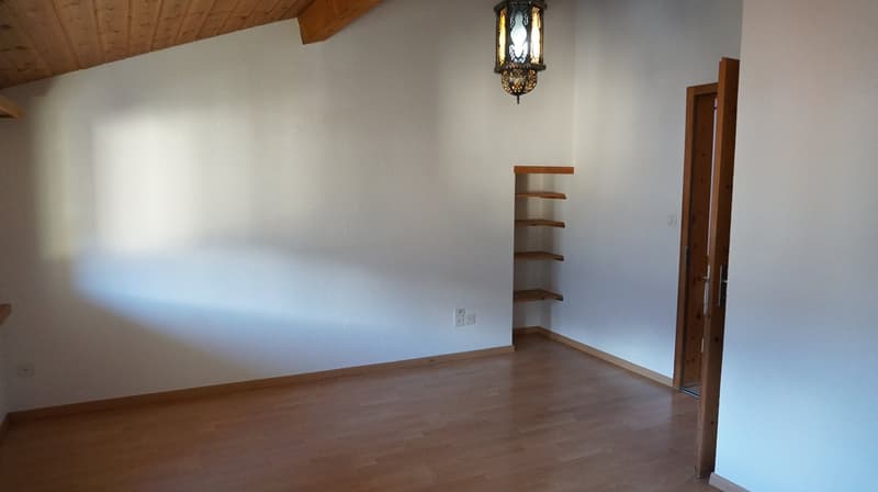 empty room, wooden floor, white walls, hanging lamp, shelves
