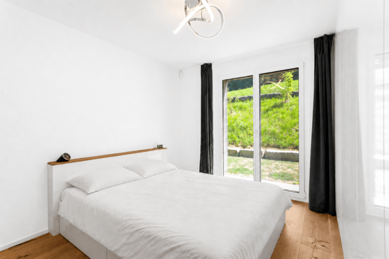 Vivere come in una casa unifamiliare - Appartamento di giardino esclusivo 4 1/2 locali con bella vista sul lago, molta privacy e costruzione di alta qualità (11)