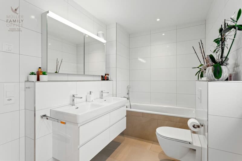 Vivere come in una casa unifamiliare - Appartamento di giardino esclusivo 4 1/2 locali con bella vista sul lago, molta privacy e costruzione di alta qualità (12)