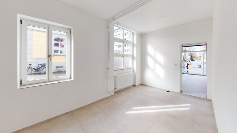 empty room, white walls, tile floor, radiator, windows, tiled floor, open door