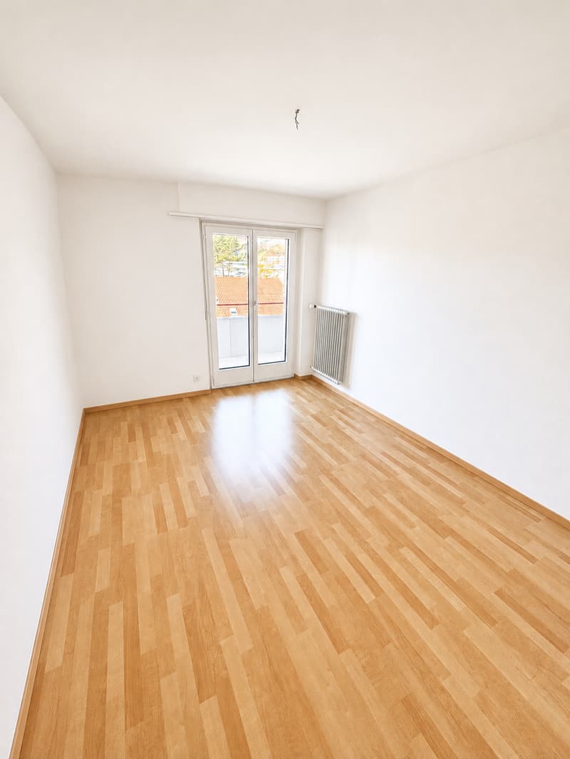 Appartamento di 4 locali luminoso e ben curato con balcone in una zona tranquilla (8)