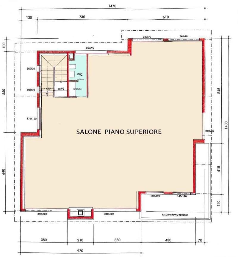 The image shows the floor plan of a property. It consists of a large open space labeled 'SALONE PIANO SUPERIORE', which appears to be a living room or lounge area. There is a small room labeled 'WC' which is likely a bathroom, and a 'GRAND.' room, which c