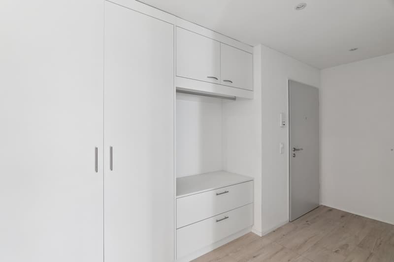 Eingangsbereich / Einbaugarderobe mit viel Stauraum