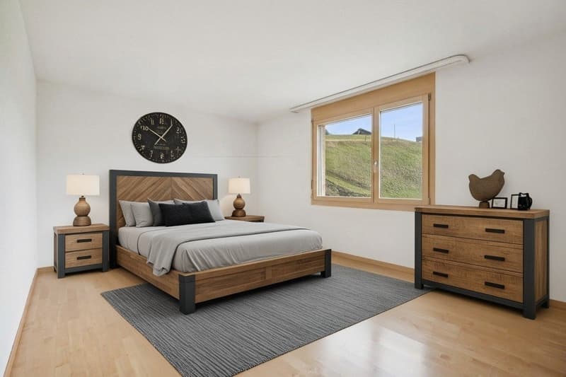 Das mit stating gestaltete Schlafzimmer überzeugt mit einem harmonischen Ambiente und einem ansprechenden Ausblick ins Grüne - ideal zum Abschalten...