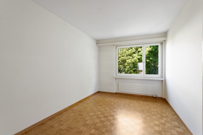 Schlafzimmer mit Sicht ins Grüne