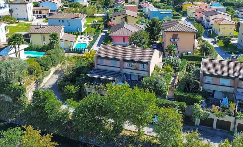 Casa gemella con giardino a Melano (1)