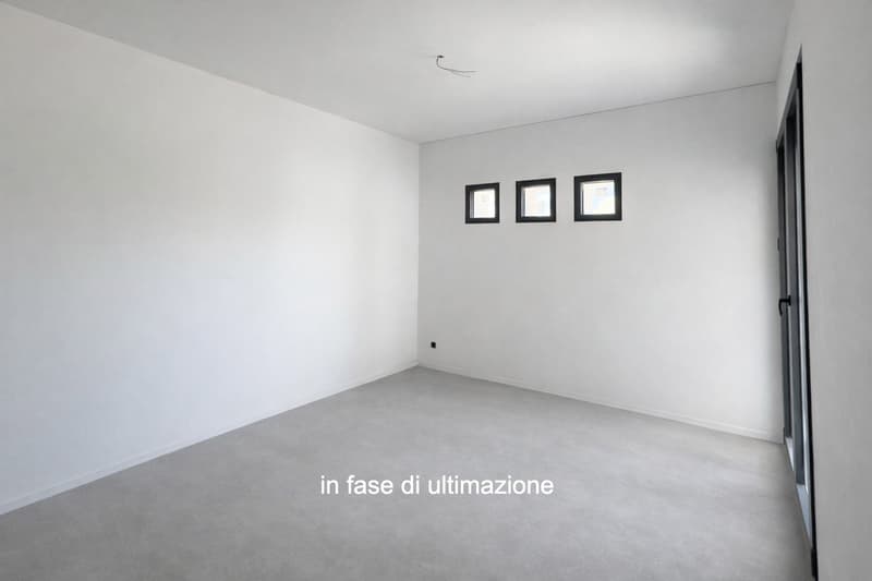 Moderner et nouveau duplex 3.5 pièces avec jardin à Melano (2)