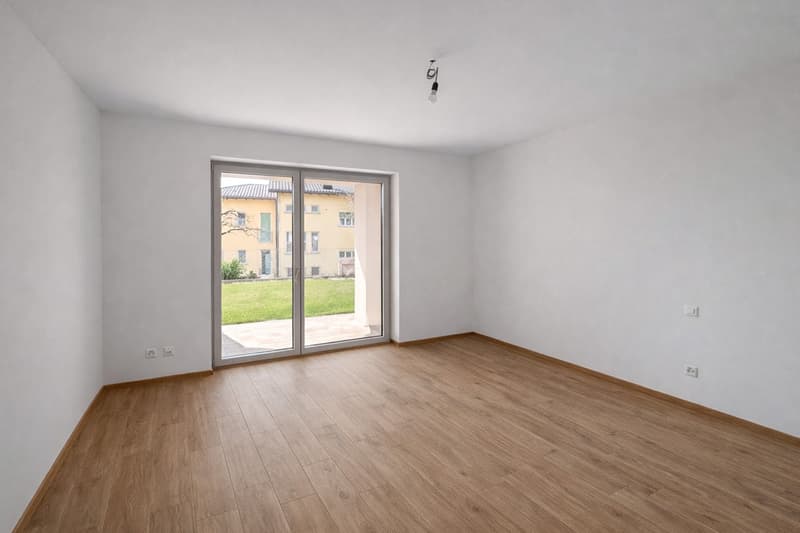 Neue 3.5-Zimmer-Wohnung mit Seeblick und Garten in Massagno (2)