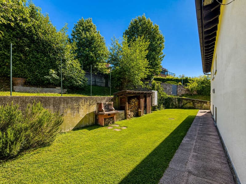 Casa unifamiliare con grande giardino a Gentilino (4)