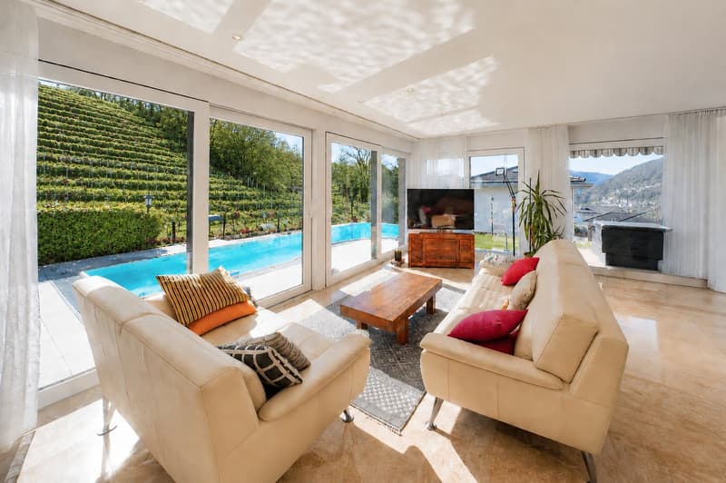 Casa unifamiliare con giardino e piscina a Bioggio (1)