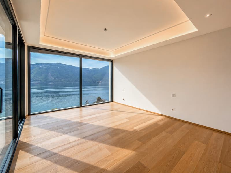 Grande appartamento con giardino e splendida vista lago a Bissone (7)