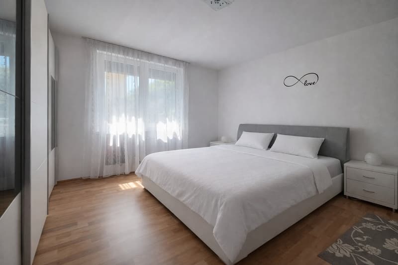 Casa bifamiliare con giardino a Canobbio (9)