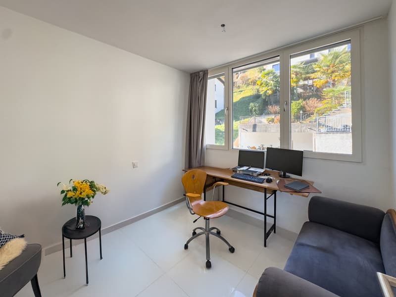 Moderna casa contigua con giardino ad Agno (6)