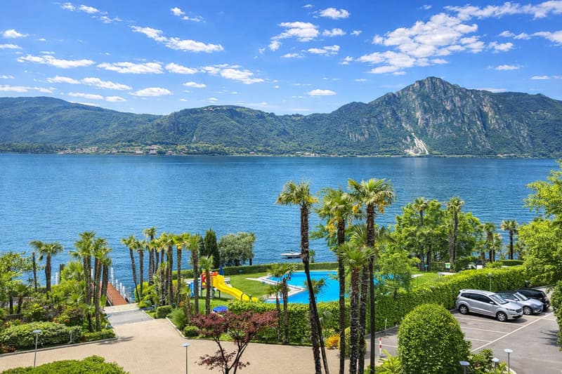 3 locali vista lago in residenza con piscina e darsena a Bissone (1)